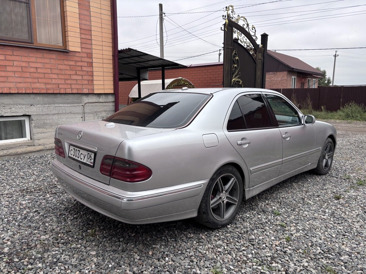 Мерседес Е210